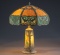 Antique curved glass Table Lamp with desirable lighted base, circa 1920s, appears to be in original