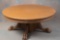 Antique round oak clawfoot Coffee Table with reeded base, circa 1910. Measures 18 1/2