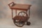 Very desirable walnut Big Wheel Tea Cart, circa 1940s, with 17