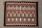 Fine condition YEI Rug with unique burnt orange trim with black, white and grey coloring, very fine