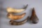 Collection of four Powder Flasks to include one brass and three steer horn: (1) One of the steer hor
