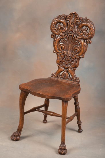 Carved American quarter sawn oak, claw foot Side Chair with fully carved Dolphins in back, attribute
