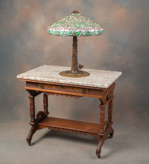 Beautiful American Victorian Library Table, circa 1890s, in nice original finish with fancy carved s