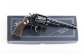 Smith & Wesson 38 M&P Model, .38 Special caliber, Serial Number C409552, manufactured in 1957, 6
