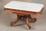 Antique Victorian Walnut marble top Coffee Table, circa 1880s, with original white porcelain rollers
