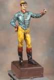 One of a Pair: A vintage cast iron Lawn Jockey on cast iron base, measuring 46