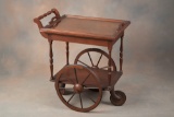 Very desirable walnut Big Wheel Tea Cart, circa 1940s, with 17