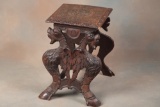 Highly carved wooden JardiniÃ¨re Stand with carved winged lions on each end and full carved top. Top