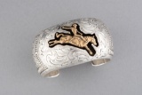 Ladies Sterling Cuff with traditional Navajo and Western engraved Bronco Buster design, marked 