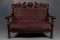 Beautiful antique mahogany Settee with beautiful pierce carved winged griffin crest, circa 1915. Bea