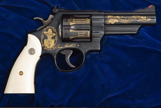 Smith and Wesson Model 29-9 Revolver, .44 MAG caliber, SN EMK0070, 4" barrel. This hardwood cased El