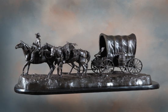 Large Western Bronze Sculpture marked "C.M. Russell", depicting horse and rider with pack mules and