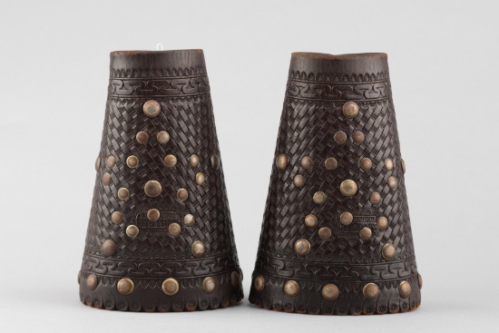 An exceptional pair of vintage "C.P. Shipley, Kansas City " marked basket weave leather and spotted