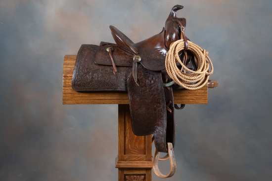Vintage "R.T. Frazier, Pueblo, Colo." marked tooled Saddle, 12" seat, 4" cantle, maker marked 4 time