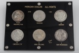 SILVER DOLLAR SET FEATURING ALL FIVE MINTS, PLUS THE REVERSE SIDE OF A MORGAN SILVER DOLLAR. Morgan