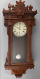 Unique antique burl walnut Waterbury Wall Clock in the Toronto Model in original finish, label and p