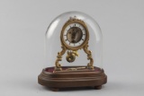 Very scarce antique miniature Skeleton Style Clock under glass dome, with porcelain dial and open es