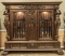 Fantastic and monumental antique mahogany double door Gun Cabinet, elaborately carved with 50