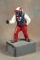 Cast iron black jockey character Hitching Post on wooden base, 30