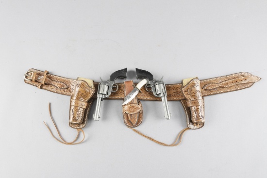 Unique miniature three-piece set includes, Single Action Revolver with matching Bowie, and original