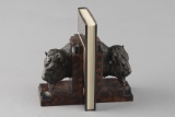 Pair of custom Buffalo Head Bookends. Buffalo Heads are molded and finished in a bronze patina. Meas
