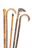 Collection of five antique Walking Sticks (2) and Canes (3). One has a Turkey Foot handle. They meas