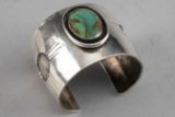 Beautiful wide silver Cuff with sun design and beautiful blue-green turquoise.