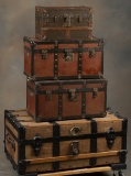 Unique collection of four antique Flat Top Trunks, all in very good condition, circa 1890-1920. The