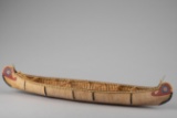 Decorative Birch Bark wrapped Canoe showing incredible detail and workmanship. Complete with oars an