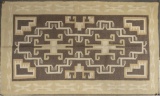 Beautiful Navajo Rug in soft natural colors-cream, tan and white. Rug measures 62