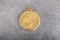 High condition Gold quarter oz. Panda Coin dated 1984 mounted in gold Bezel.