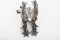 A pair of Russell Yates double mounted Spurs, #244, with copper and silver floral hand engraved over