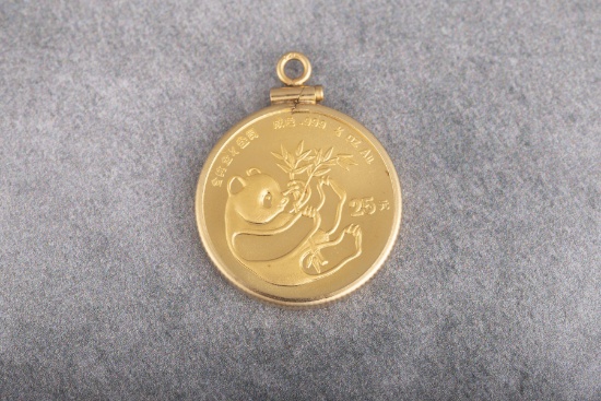 High condition Gold quarter oz. Panda Coin dated 1984 mounted in gold Bezel.