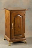 Decorative oak single door Slot Machine Stand on brass feet, measures 34