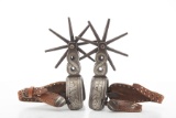 Incredible pair of large Chihuahua single mounted Spurs with hand engraved and inlaid heel bands and