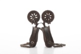 Very desirable Iron Mexican Spurs with lightly engraved heel bands, chap guards, and 2 1/2