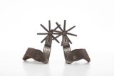 Outstanding pair of large Iron Mexican Spurs, single mounted with engraved silver and 6