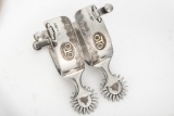 A pair of Russell Yates double mounted Spurs, #197, with silver and gold overlay on 1 3/4