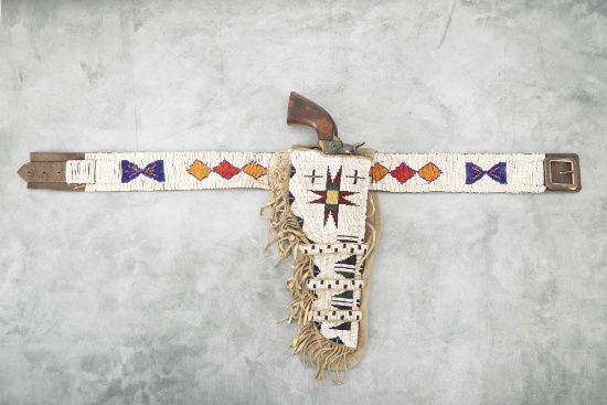 Vintage fully beaded triple loop Holster and matching Belt. Holster is  bordered with 2 1/2" fringe.