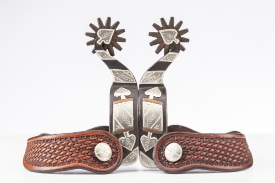 Pair of "Wayne  Paul" marked double mounted Spurs, #2094, with sterling silver engraved overlay in t