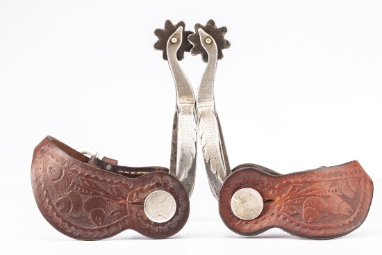 Pair of "Ray Anderson" marked single mounted Spurs, #109, done in the goose head pattern, hand engra