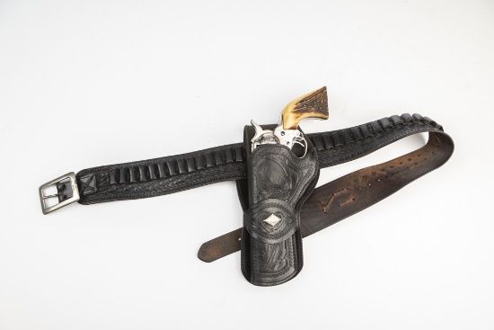 Nice vintage single loop Tooled Holster and matching Cartridge Belt, maker mark not legible, leather