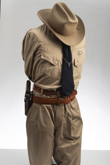 Mannequin dressed in Law Enforcement Uniform to include dress belt, gun belt marked "El Paso Saddler