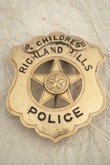 Gold tone Shield Badge with cut-out 5-point Star, measures 2 1/8â€ T x 1 Â¾â€ W, marked â€œRICHLAN