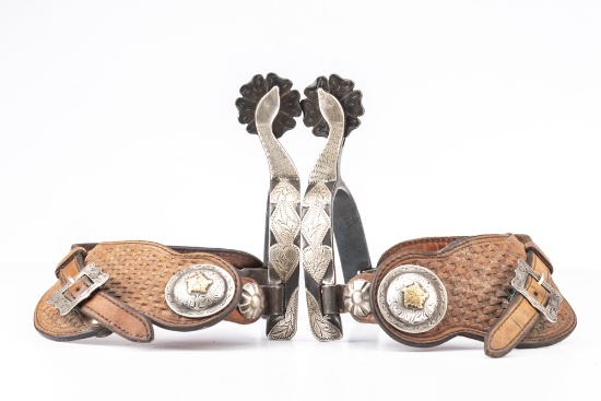 Pair of "Ray Anderson" marked, single mounted Spurs, #993, sterling mounted in the famous goose head