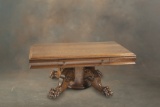 Outstanding antique quarter sawn oak, oversized Coffee Table on massive claw foot pedestal base, cir