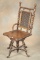 Scarce antique Hunzinger walnut revolving high back Piano Stool, circa 1890, with wooden ball and cl