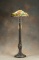 Beautiful antique bronze and leaded glass shade Floor Lamp, circa 1920s, with extremely ornate pierc