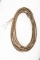 Vintage braided rawhide Reata, approximately 40 ft. long with rawhide and braided hondo. Very good c