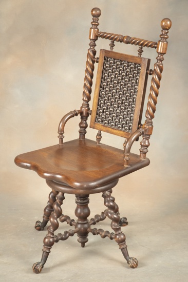 Scarce antique Hunzinger walnut revolving high back Piano Stool, circa 1890, with wooden ball and cl